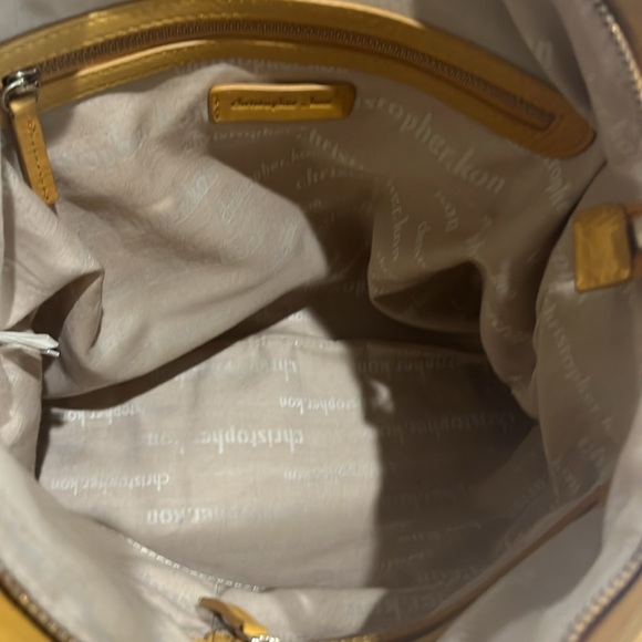 Handbag by Christopher Kon, Butterscotch leather. 15.5” w, 14.25” l, 1” d, - Picture 7 of 11